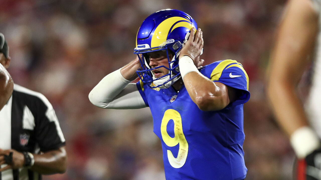 TAMPA, FL - NOVEMBER 6: Matthew Stafford #9 of the Los Angeles Rams listens to his helmet headset before a play during an NFL football game against the Tampa Bay Buccaneers at Raymond James Stadium on November 6, 2022 in Tampa, Florida.