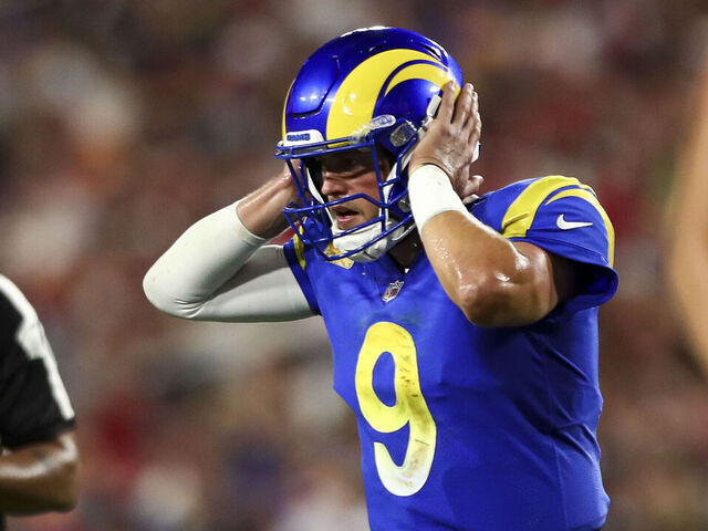 TAMPA, FL - NOVEMBER 6: Matthew Stafford #9 of the Los Angeles Rams listens to his helmet headset before a play during an NFL football game against the Tampa Bay Buccaneers at Raymond James Stadium on November 6, 2022 in Tampa, Florida.