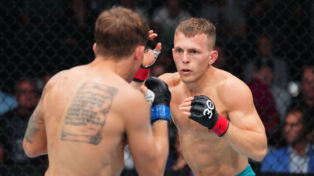 BOSTON, MASSACHUSETTS - AUGUST 19: (R-L) Brad Katona of Canada battles Cody Gibson in a bantamweight fight during the UFC 292 event at TD Garden on August 19, 2023 in Boston, Massachusetts.