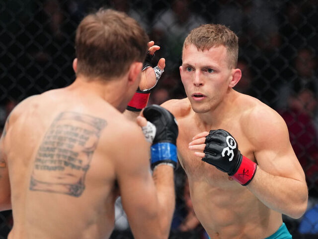 BOSTON, MASSACHUSETTS - AUGUST 19: (R-L) Brad Katona of Canada battles Cody Gibson in a bantamweight fight during the UFC 292 event at TD Garden on August 19, 2023 in Boston, Massachusetts.