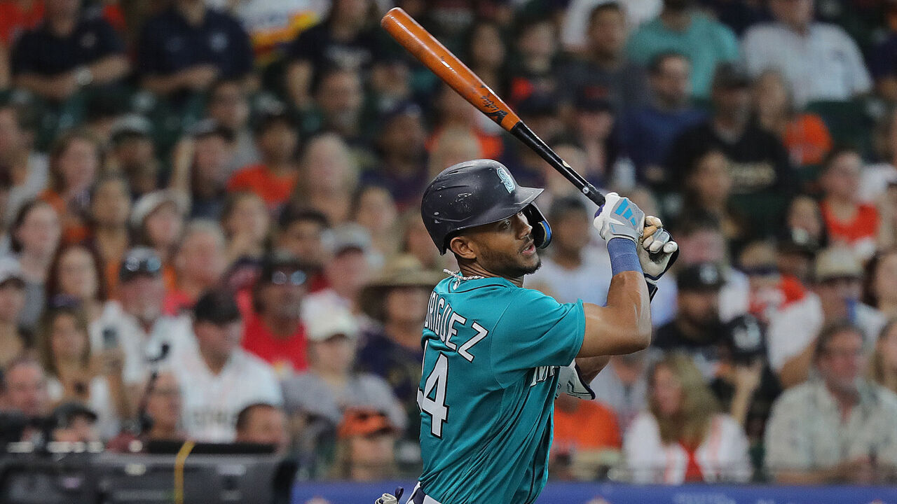 HOUSTON, TEXAS - AUGUST 19: Julio Rodriguez #44 of the Seattle Mariners singles in the first inning against the Houston Astros at Minute Maid Park on August 19, 2023 in Houston, Texas.