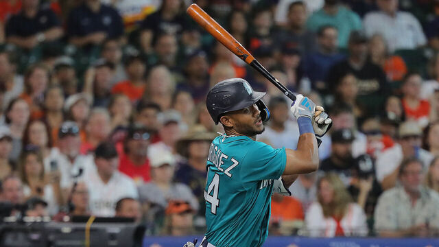 HOUSTON, TEXAS - AUGUST 19: Julio Rodriguez #44 of the Seattle Mariners singles in the first inning against the Houston Astros at Minute Maid Park on August 19, 2023 in Houston, Texas.