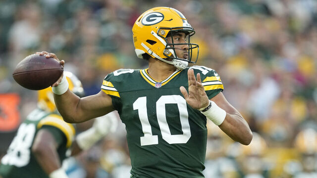 GREEN BAY, WISCONSIN - AUGUST 19: Jordan Love #10 of the Green Bay Packers looks to throw a pass in the first quarter against the New England Patriots during a preseason game at Lambeau Field on August 19, 2023 in Green Bay, Wisconsin.