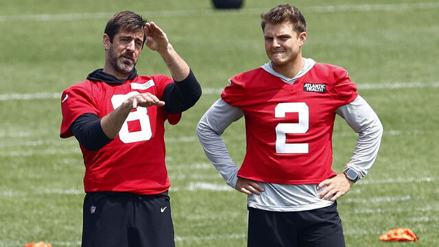 FLORHAM PARK, NEW JERSEY - JUNE 6: Quarterbacks Aaron Rodgers #8 and Zach Wilson #2 of the New York Jets talk during the team's OTA's at Atlantic Health Jets Training Center on June 6, 2023 in Florham Park, New Jersey.