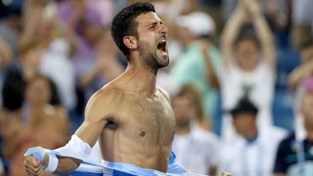 MASON, OHIO - AUGUST 20: Novak Djokovic of Serbia tears his shirt off after defeating Carlos Alcaraz of Spain during the final of the Western & Southern Open at Lindner Family Tennis Center on August 20, 2023 in Mason, Ohio.
