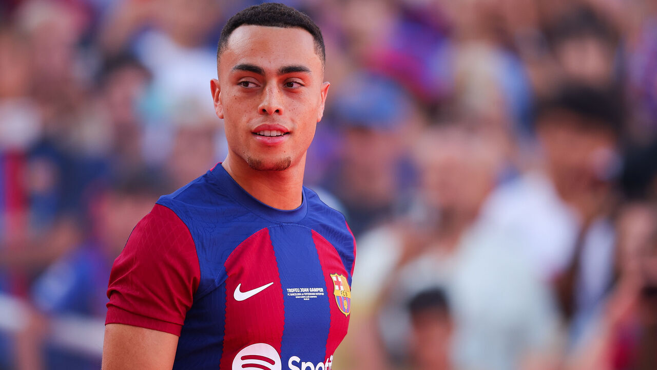 BARCELONA, SPAIN - AUGUST 08: Sergiño Dest of FC Barcelona waves the supporters during the presentation prior to the Joan Gamper Trophy match between FC Barcelona and Tottenham Hotspur at Estadi Olimpic Lluis Companys on August 08, 2023 in Barcelona, Spain.