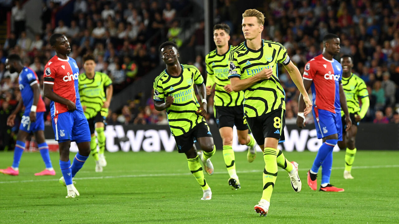 LONDON, ENGLAND - AUGUST 21: Martin Odegaard of Arsenal celebrates after scoring the team's first goal during the Premier League match between Crystal Palace and Arsenal FC at Selhurst Park on August 21, 2023 in London, England.