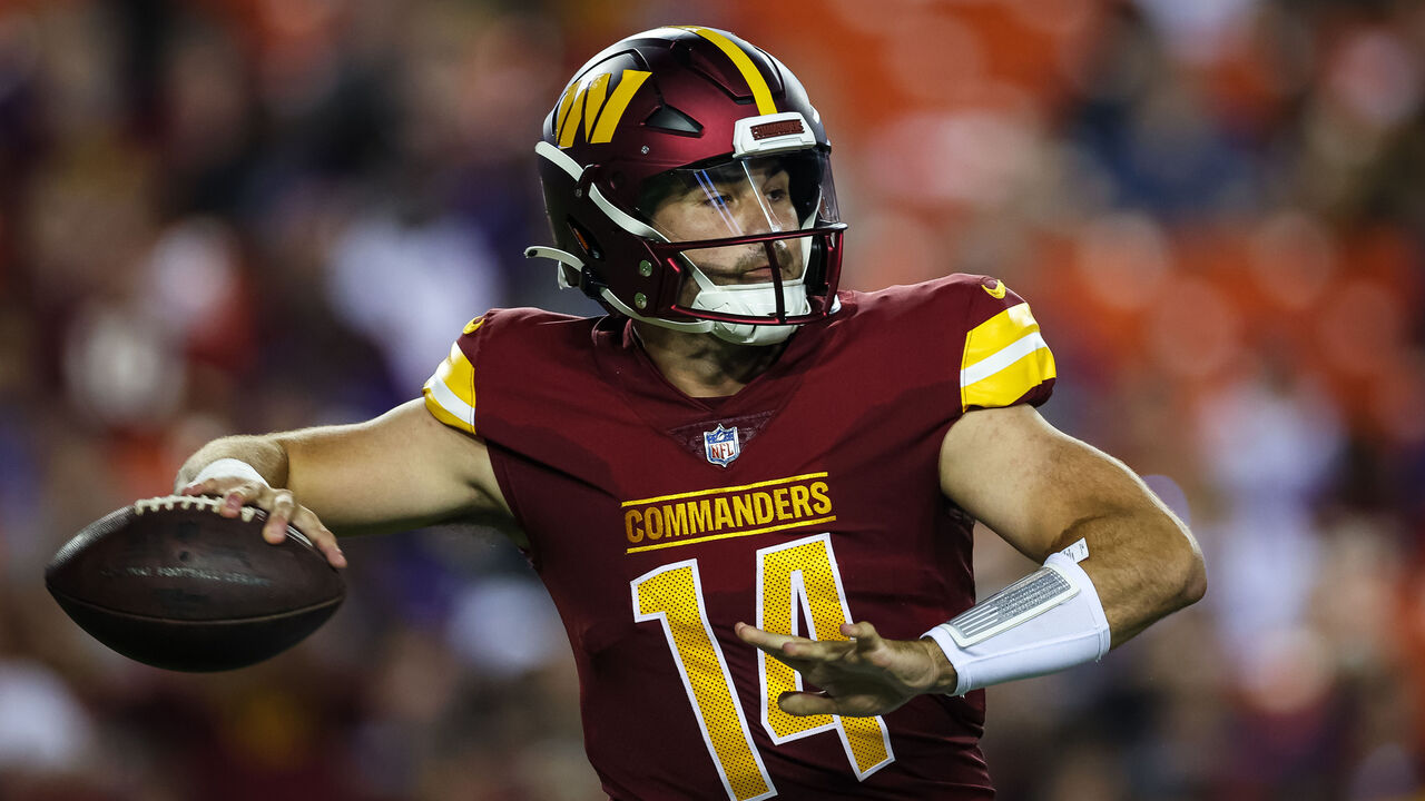 Washington Commanders quarterback Sam Howell gets off a successful News  Photo - Getty Images