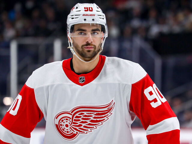 WINNIPEG, CANADA - MARCH 31: Joe Veleno #90 of the Detroit Red Wings looks on during a third period stoppage in play against the Winnipeg Jets at the Canada Life Centre on March 31, 2023 in Winnipeg, Manitoba, Canada. The Jets defeated the Wings 6-2.