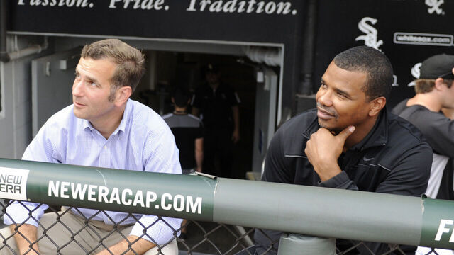 CHICAGO, IL - AUGUST 12: Ozzie Guillen #13 manager of the Chicago White Sox (L), Rick Hahn White Sox assistant general manager (C), and Kenny Williams general manager talk before the game against the Kansas City Royals on August 12, 2011 at U.S. Cellular Field in Chicago, Illinois.