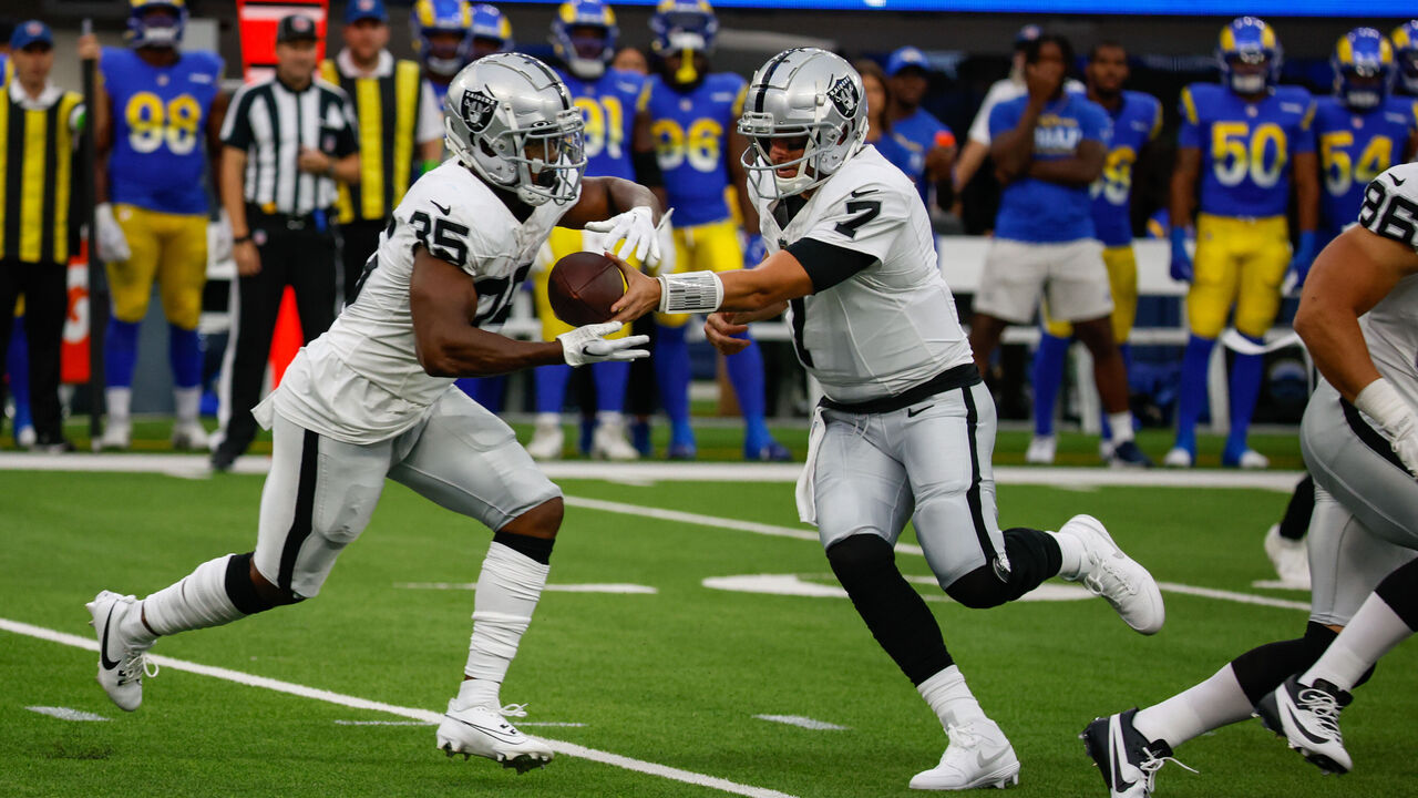 Running back Zamir White of the Las Vegas Raiders runs for first