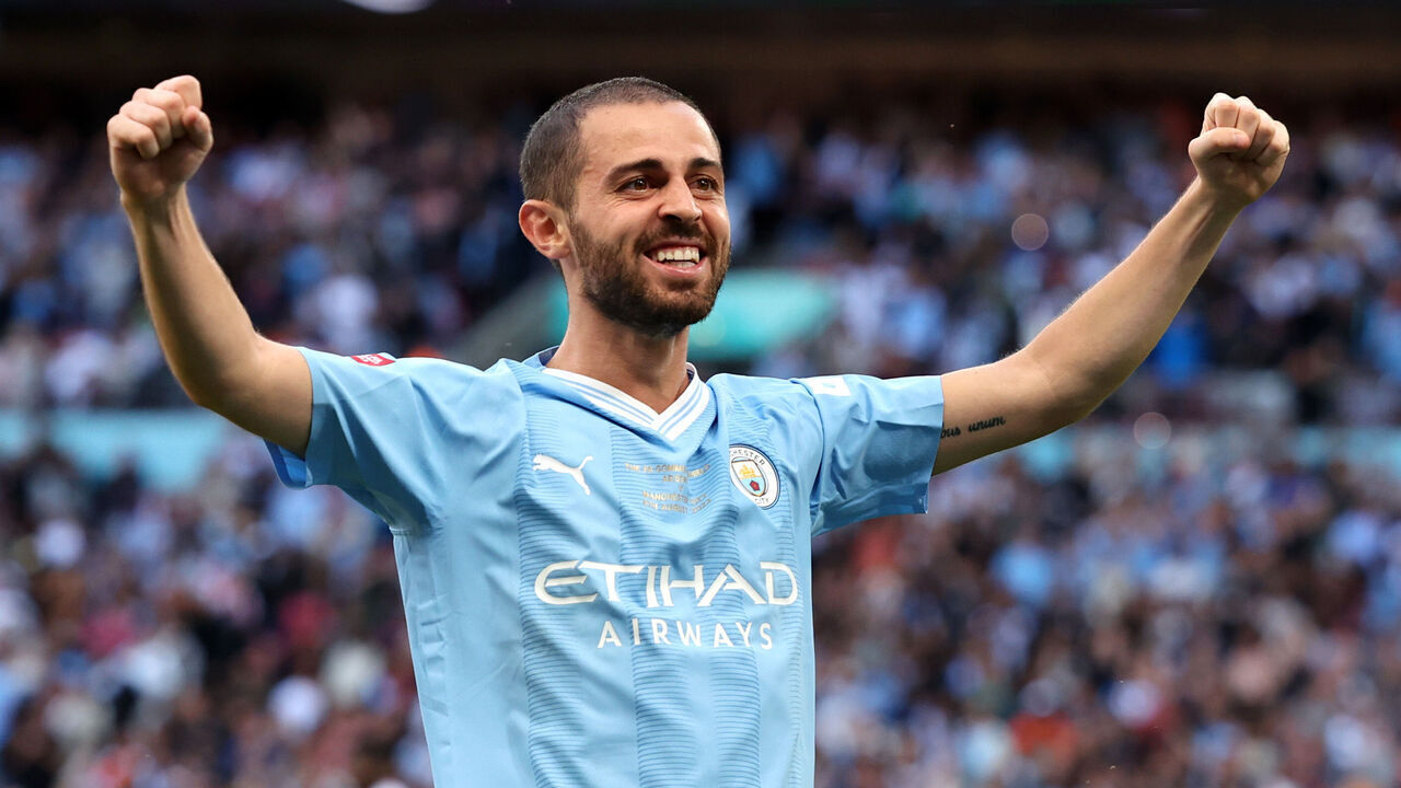 LONDON, ENGLAND - AUGUST 06: Bernardo Silva of Manchester City celebrates after teammate Cole Palmer (not pictured) scores the team's first goal during The FA Community Shield match between Manchester City against Arsenal at Wembley Stadium on August 06, 2023 in London, England.