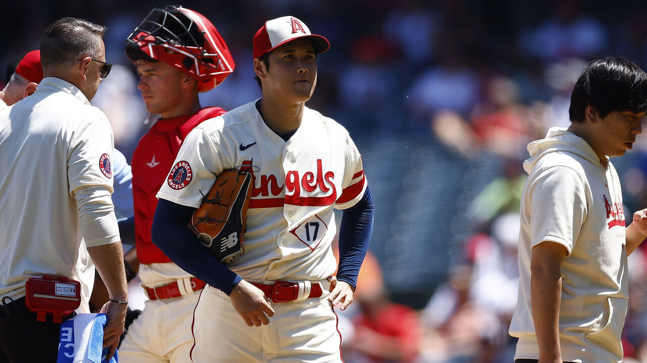 ANAHEIM, CALIFORNIA - AUGUST 23: Shohei Ohtani #17 of the Los Angeles Angels leaves the game against the Cincinnati Reds in the second inning during game one of a doubleheader at Angel Stadium of Anaheim on August 23, 2023 in Anaheim, California.