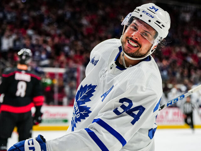 RALEIGH, NORTH CAROLINA - MARCH 25: Auston Matthews #34 of the Toronto Maple Leafs celebrates his second period goal against the Carolina Hurricanes at PNC Arena on March 25, 2023 in Raleigh, North Carolina.