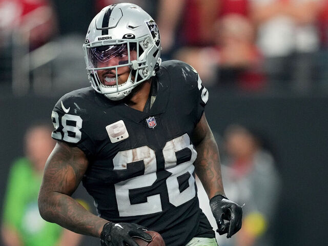 LAS VEGAS, NEVADA - JANUARY 01: Josh Jacobs #28 of the Las Vegas Raiders celebrates a touchdown against the San Francisco 49ers during the fourth quarter at Allegiant Stadium on January 01, 2023 in Las Vegas, Nevada.
