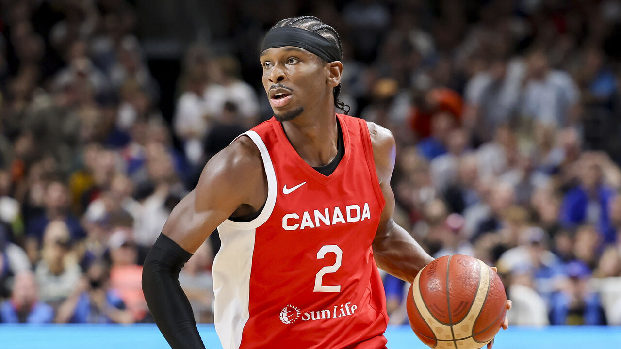 BERLIN, GERMANY - AUGUST 9: Shai Gilgeous-Alexander of Canada controls the ball during the Basketball Friendly match between Germany and Canada at Mercedes-Benz Arena on August 9, 2023 in Berlin, Germany.