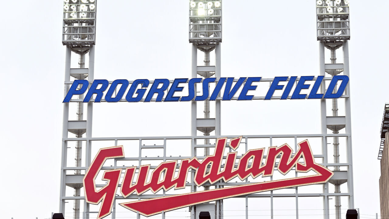 CLEVELAND, OHIO - APRIL 15: The new logo for the Cleveland Guardians hangs above the bleacher section of Progressive Field prior ot the home opener against the San Francisco Giants on April 15, 2022 in Cleveland, Ohio.