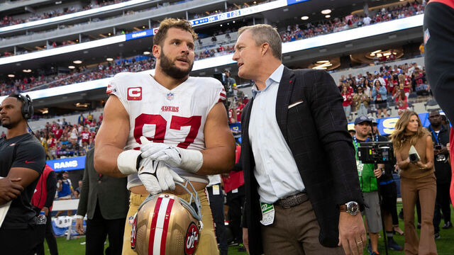 INGLEWOOD, CA - OCTOBER 30: Nick Bosa #97 and General Manager John Lynch of the San Francisco 49ers on the sideline during the game against the Los Angeles Rams at SoFi Stadium on October 30, 2022 in Inglewood, California. The 49ers defeated the Rams 31-14.