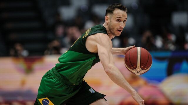 Brazil's Marcelinho Huertas dribbles the ball during the FIBA Basketball World Cup Group G match between Iran and Brazil at Indonesia Arena in Jakarta on August 26, 2023.