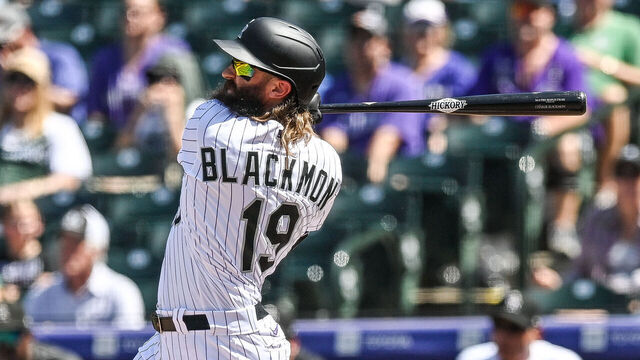 DENVER, CO - AUGUST 20: Charlie Blackmon #19 of the Colorado Rockies hits a third inning solo home run against the Chicago White Sox at Coors Field on August 20, 2023 in Denver, Colorado.