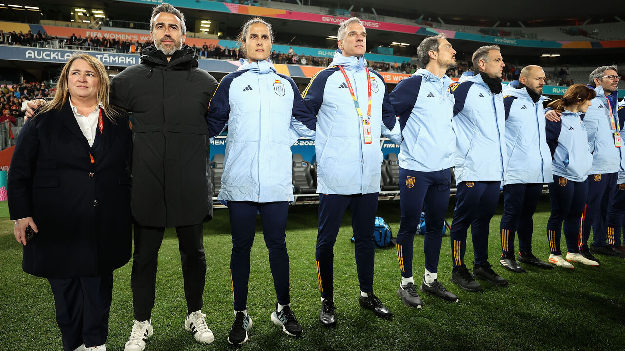AUCKLAND, NEW ZEALAND - JULY 26: Jorge Vilda (2nd L), Head Coach of Spain, and team staffs line up for the national anthem prior to the FIFA Women's World Cup Australia & New Zealand 2023 Group C match between Spain and Zambia at Eden Park on July 26, 2023 in Auckland, New Zealand.