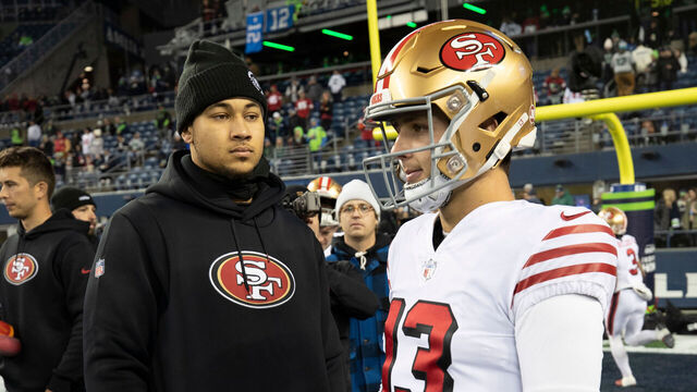 SEATTLE, WA - DECEMBER 15: Trey Lance #5 and Brock Purdy #13 of the San Francisco 49ers on the field before the game against the Seattle Seahawks at Lumen Field on December 15, 2022 in Seattle, Washington. The 49ers defeated the Seahawks 21-13.