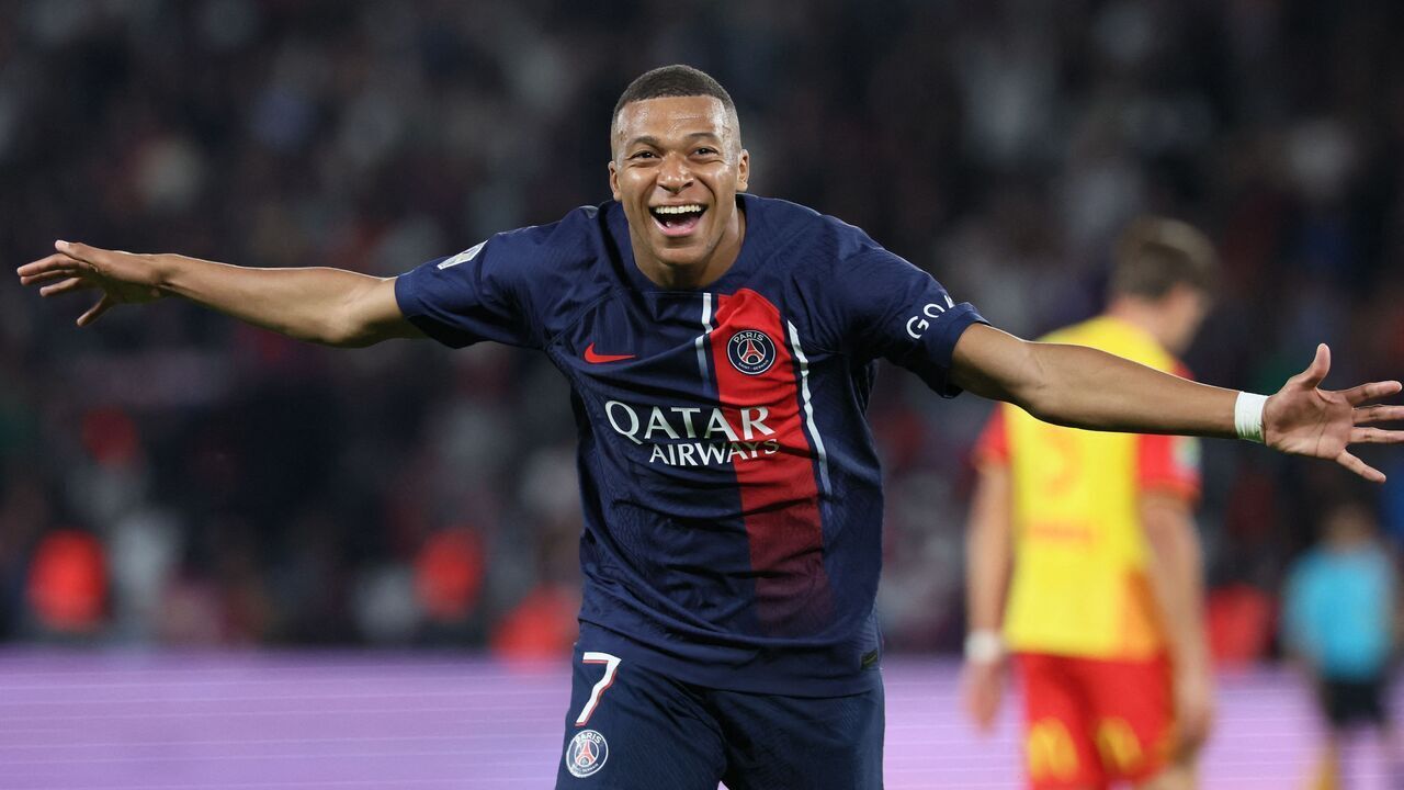 Paris Saint-Germain's French forward #07 Kylian Mbappe celebrates scoring Paris Saint-Germain's third goal during the French L1 football match between Paris Saint-Germain (PSG) and RC Lens at the Parc des Princes Stadium in Paris on August 26, 2023.