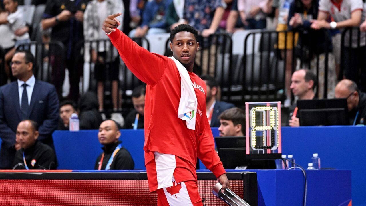 Canada's RJ Barrett gestures after receiving the MVP of the game after the FIBA Basketball World Cup group H between Canada and Lebanon at Indonesia Arena in Jakarta on August 27, 2023.