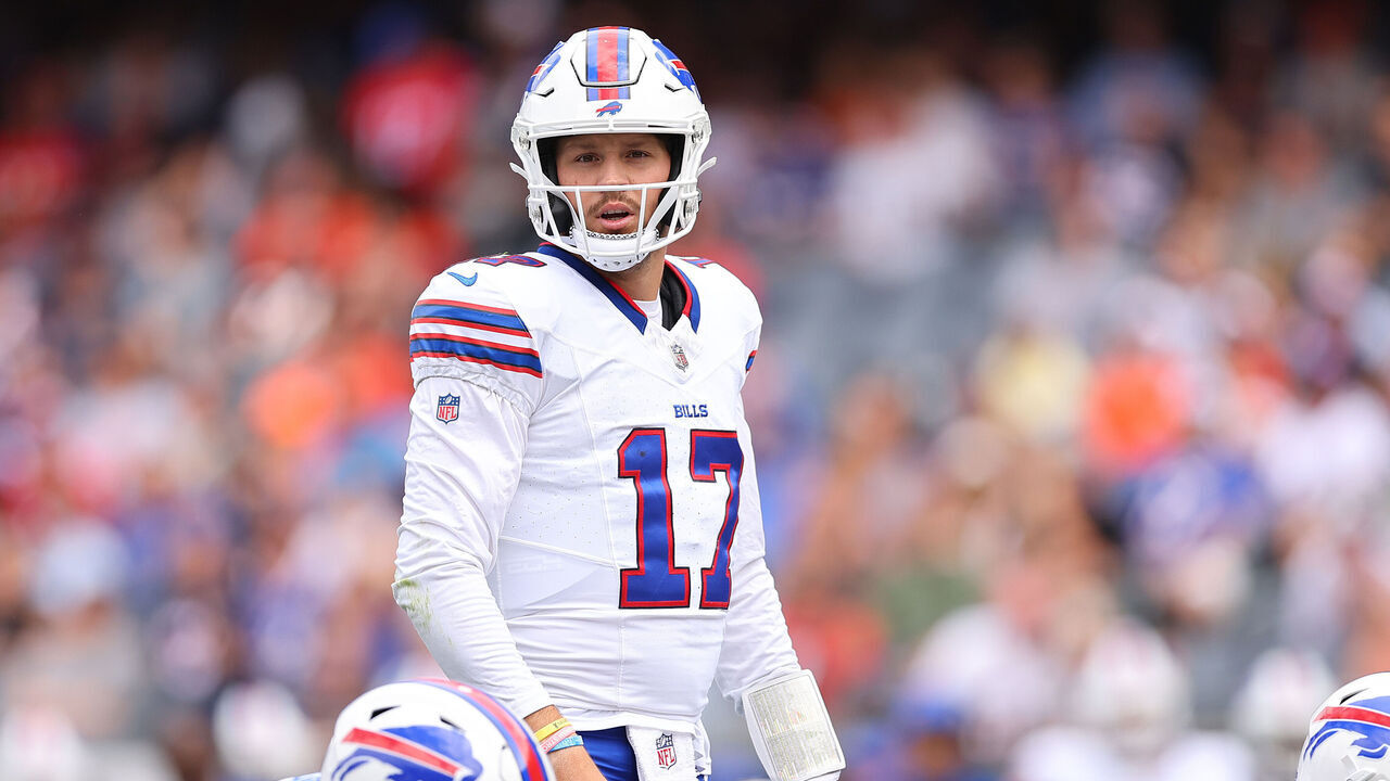 CHICAGO, ILLINOIS - AUGUST 26: Josh Allen #17 of the Buffalo Bills looks on under center against the Chicago Bears during the first half of a preseason game at Soldier Field on August 26, 2023 in Chicago, Illinois.