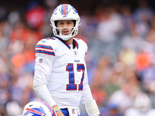 CHICAGO, ILLINOIS - AUGUST 26: Josh Allen #17 of the Buffalo Bills looks on under center against the Chicago Bears during the first half of a preseason game at Soldier Field on August 26, 2023 in Chicago, Illinois.