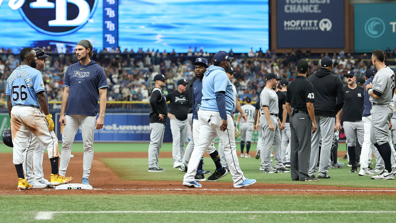 TAMPA, FL - AUGUST 27: On field delay after Randy Arozarena #56 of the Tampa Bay Rays steals third base in the eighth inning during the game between the New York Yankees and the Tampa Bay Rays at Tropicana Field on Sunday, August 27, 2023 in Tampa, Florida.