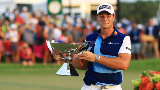 ATLANTA, GEORGIA - AUGUST 27: Viktor Hovland of Norway celebrates with the FedEx Cup after winning during the final round of the TOUR Championship at East Lake Golf Club on August 27, 2023 in Atlanta, Georgia.