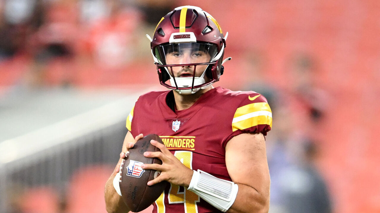 CLEVELAND, OHIO - AUGUST 11: Sam Howell #14 of the Washington Commanders warms up prior to a preseason game against the Cleveland Browns at Cleveland Browns Stadium on August 11, 2023 in Cleveland, Ohio.