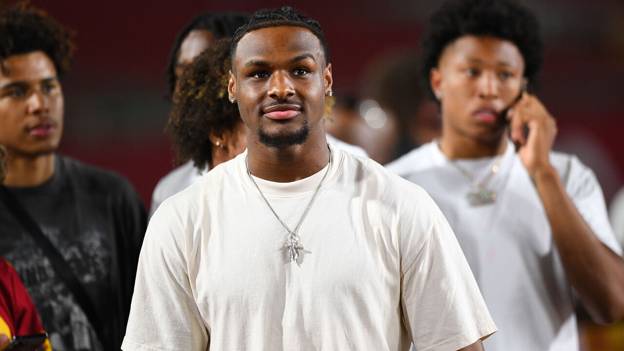 LOS ANGELES, CA - AUGUST 26: USC basketball player Bronny James looks on during a game between the San Jose State Spartans and the USC Trojans on August 26, 2023, at Los Angeles Memorial Coliseum in Los Angeles, CA.