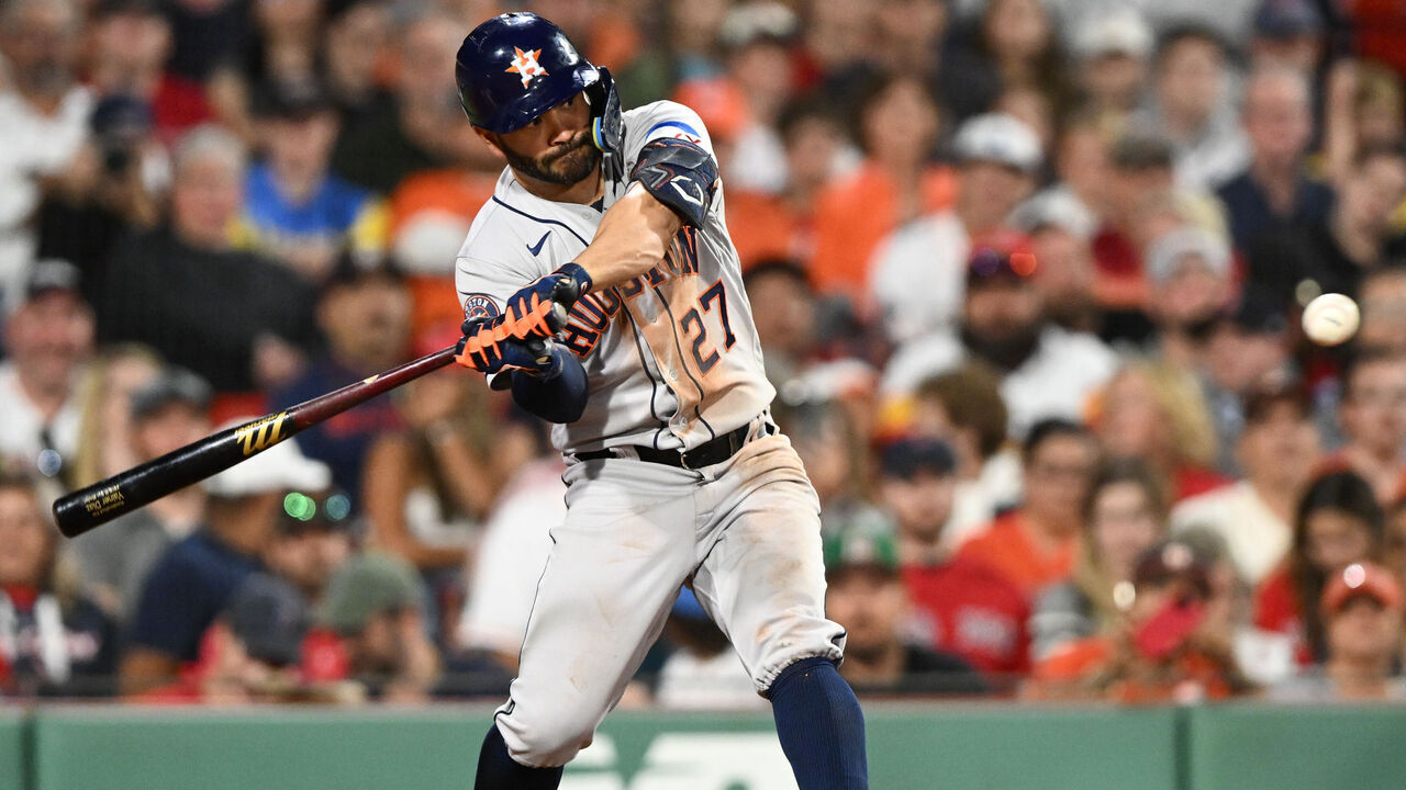BOSTON, MASSACHUSETTS - AUGUST 28: Jose Altuve #27 of the Houston Astros hits a two-run RBI triple against the Boston Red Sox during the sixth inning at Fenway Park on August 28, 2023 in Boston, Massachusetts.