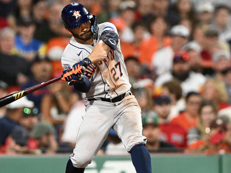 Houston Astros Jose Altuve (27) hits a two-run home run during the