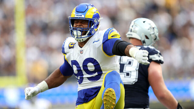 INGLEWOOD, CALIFORNIA - OCTOBER 09: Aaron Donald #99 of the Los Angeles Rams reacts after sacking Cooper Rush #10 of the Dallas Cowboys during the first half of a game at SoFi Stadium on October 09, 2022 in Inglewood, California.