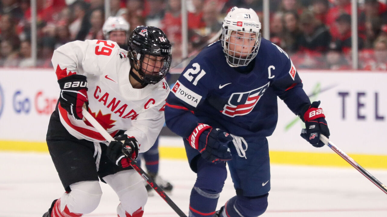 BRAMPTON, ONTARIO - APRIL 16: Forward Marie-Philip Poulin #29 of Canada skates against forward Hilary Knight #21 of USA during the gold medal game of the 2023 IIHF Women's World Championship at CAA Centre on April 16, 2023 in Brampton, Ontario.