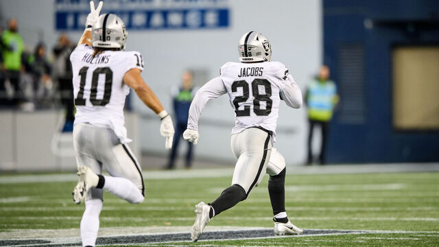 SEATTLE, WASHINGTON - NOVEMBER 27: Josh Jacobs #28 of the Las Vegas Raiders carries the ball for a touchdown in overtime to beat the Seattle Seahawks 40-34 at Lumen Field on November 27, 2022 in Seattle, Washington.