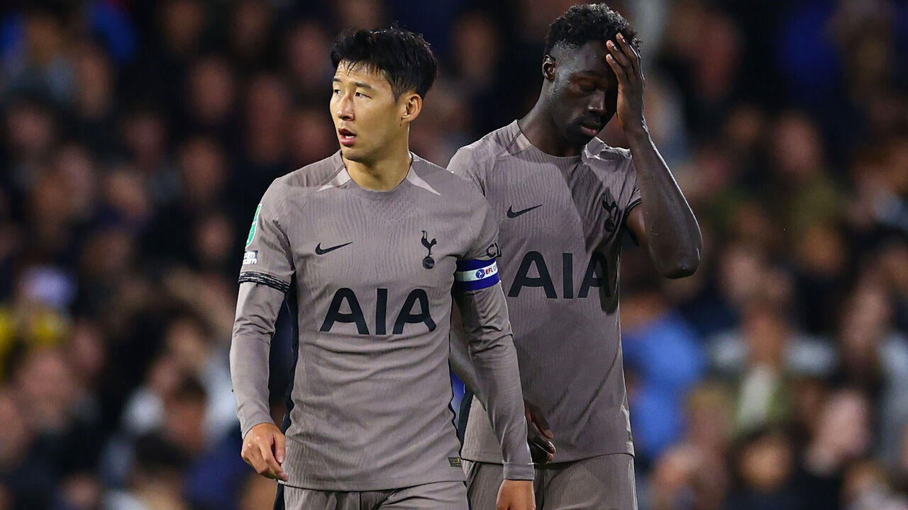 LONDON, ENGLAND - AUGUST 29: Heung-Min Son and Davinson Sanchez of Tottenham Hotspur look dejected after their loss in the penalty shoot out following the Carabao Cup Second Round match between Fulham and Tottenham Hotspur at Craven Cottage on August 29, 2023 in London, England.