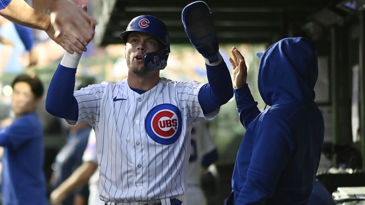 CHICAGO, ILLINOIS - AUGUST 29: Nico Hoerner #2 of the Chicago Cubs celebrates after scoring in the first inning against the Milwaukee Brewers at Wrigley Field on August 29, 2023 in Chicago, Illinois.