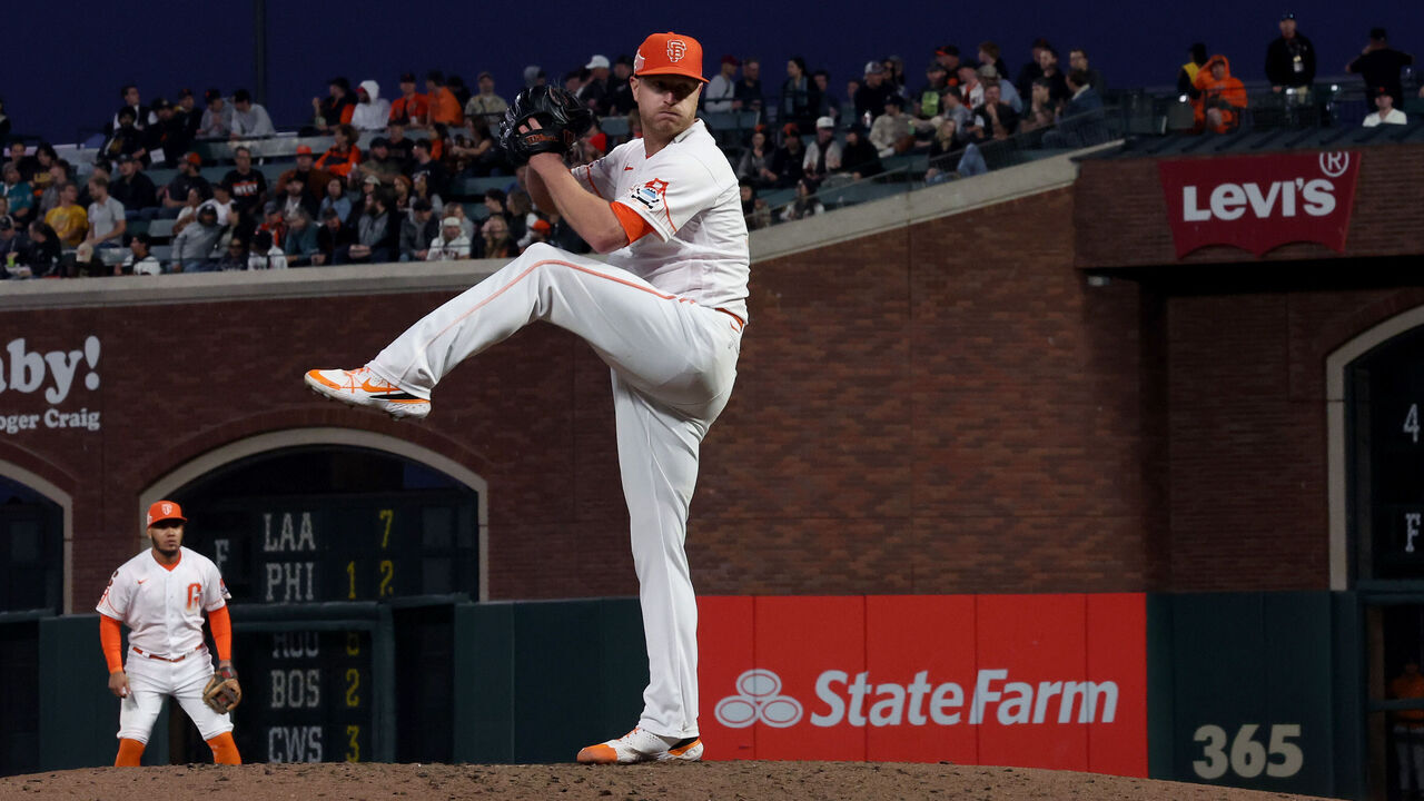 SAN FRANCISCO, CALIFORNIA - AUGUST 29: Alex Cobb #38 of the San Francisco Giants pitches against the Cincinnati Reds as a almost full moon rises behind him in the fifth inning at Oracle Park on August 29, 2023 in San Francisco, California.
