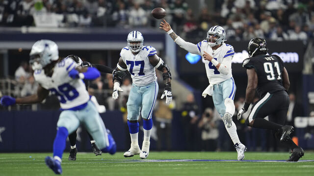 ARLINGTON, TX - DECEMBER 24: Dak Prescott #4 of the Dallas Cowboys throws the ball against the Philadelphia Eagles at AT&T Stadium on December 24, 2022 in Arlington, Texas.