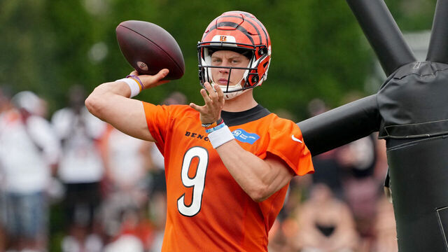 CINCINNATI, OHIO - JULY 26: Joe Burrow #9 of the Cincinnati Bengals participates in a drill during training camp at Kettering Health Practice Fields on July 26, 2023 in Cincinnati, Ohio.