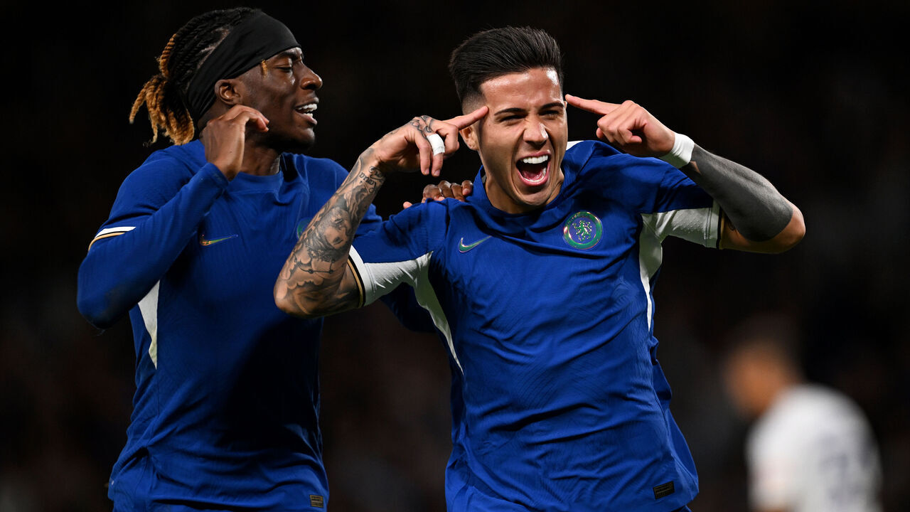 LONDON, ENGLAND - AUGUST 30: Enzo Fernandez of Chelsea (R) celebrates with teammate Noni Madueke after scoring the team's second goal during the Carabao Cup Second Round match between Chelsea and AFC Wimbledon at Stamford Bridge on August 30, 2023 in London, England.