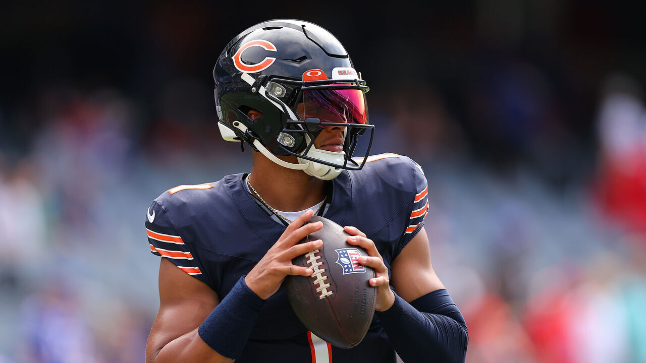 CHICAGO, ILLINOIS - AUGUST 26: Justin Fields #1 of the Chicago Bears warms upprior to a preseason game against the Buffalo Bills at Soldier Field on August 26, 2023 in Chicago, Illinois.