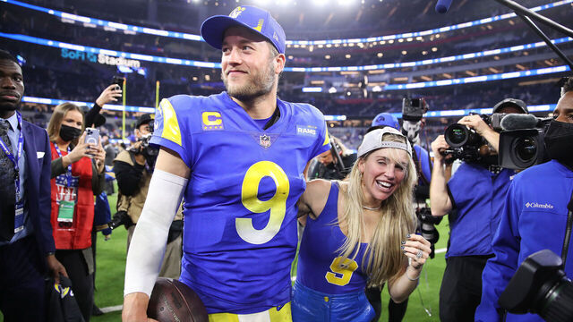 INGLEWOOD, CALIFORNIA - JANUARY 30: Matthew Stafford #9 of the Los Angeles Rams and wife Kelly Hall react after defeating the San Francisco 49ers in the NFC Championship Game at SoFi Stadium on January 30, 2022 in Inglewood, California. The Rams defeated the 49ers 20-17.