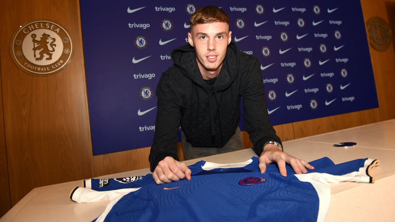COBHAM, ENGLAND - SEPTEMBER 01: Cole Palmer poses for a photograph as he is signs for Chelsea FC at Chelsea Training Ground on September 01, 2023 in Cobham, England.