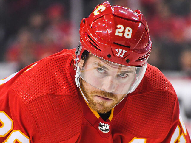 CALGARY, CANADA - APRIL 2: Elias Lindholm #28 of the Calgary Flames in action against the Anaheim Ducks during an NHL game at Scotiabank Saddledome on April 2, 2023 in Calgary, Alberta, Canada. The Flames defeated the Ducks 5-4.