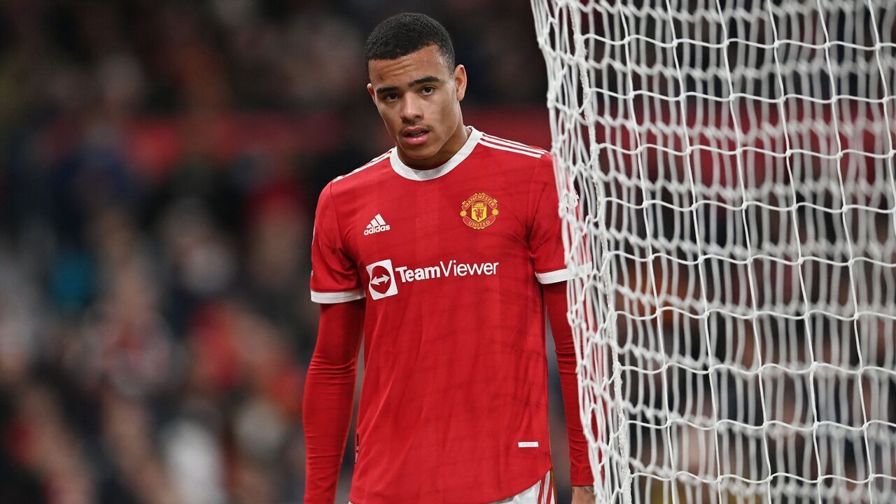 Manchester United's English striker Mason Greenwood is substituted during the English Premier League football match between Manchester United and Wolverhampton Wanderers at Old Trafford in Manchester, north west England, on January 3, 2022. - RESTRICTED TO EDITORIAL USE. No use with unauthorized audio, video, data, fixture lists, club/league logos or 'live' services. Online in-match use limited to 120 images. An additional 40 images may be used in extra time. No video emulation. Social media in-match use limited to 120 images. An additional 40 images may be used in extra time. No use in betting publications, games or single club/league/player publications.